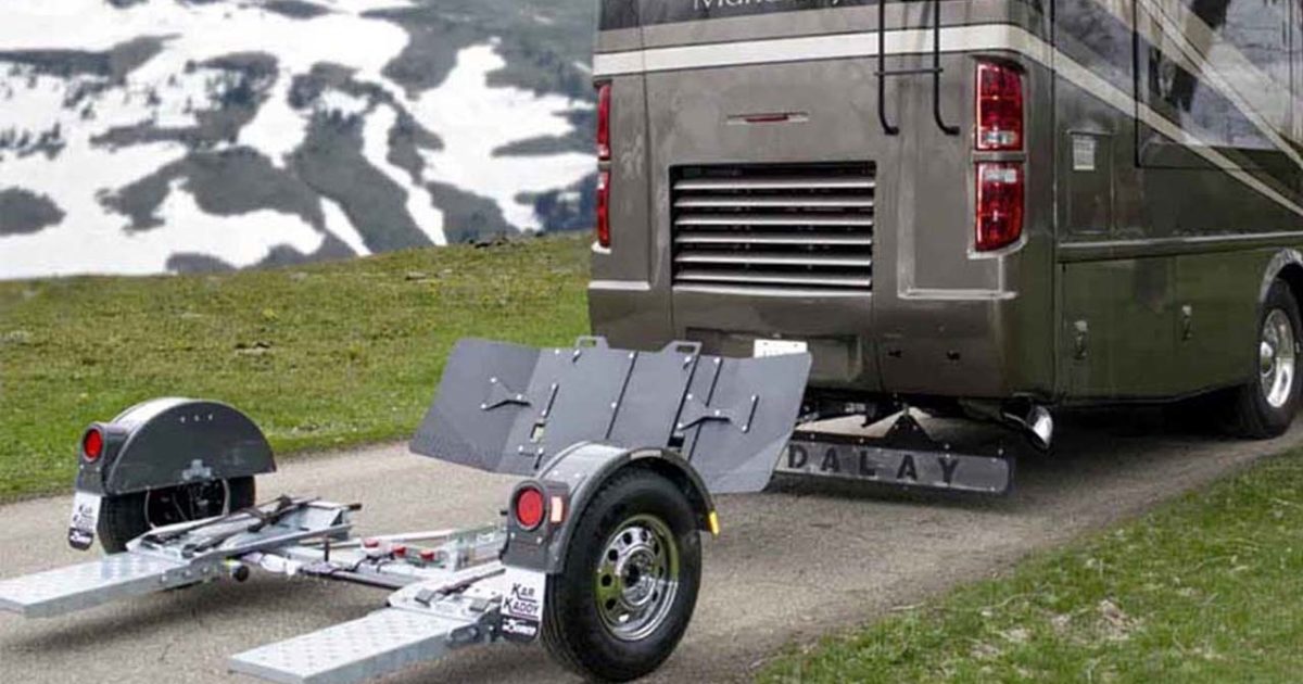 A tow dolly attached to an RV